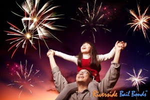 2father-and-daughter-looking-fireworks-in-the-evening-sky